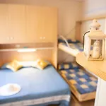 אתר קמפינג Family Kids Village Riva Dei Pini לידו די פרמו